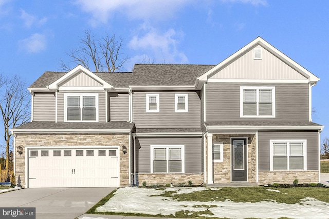 view of front of house with a garage, concrete driveway, a shingled roof, and stone siding