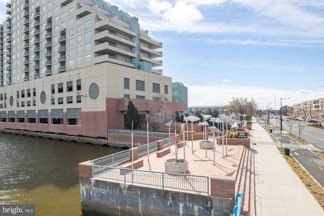 view of property with a water view