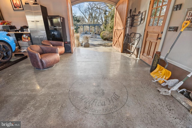 garage featuring baseboards