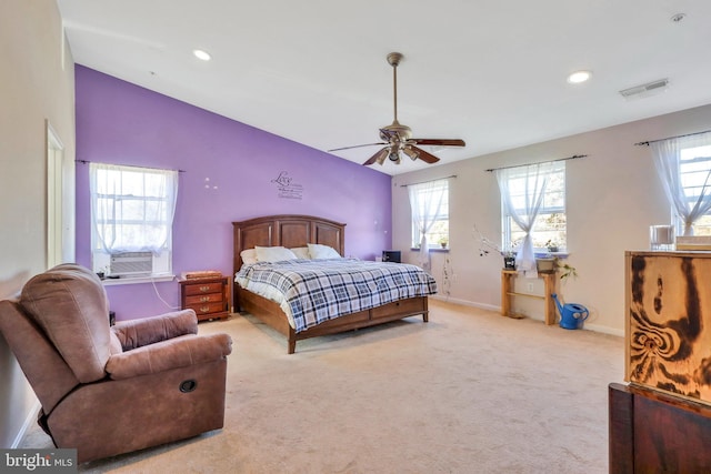 carpeted bedroom with cooling unit, ceiling fan, and vaulted ceiling