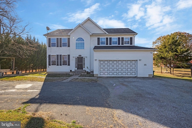 view of front of house with a garage