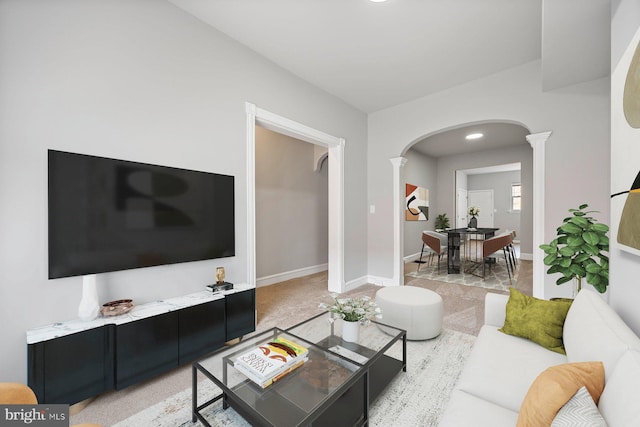 living room with decorative columns