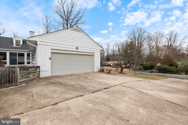 view of property exterior with a garage