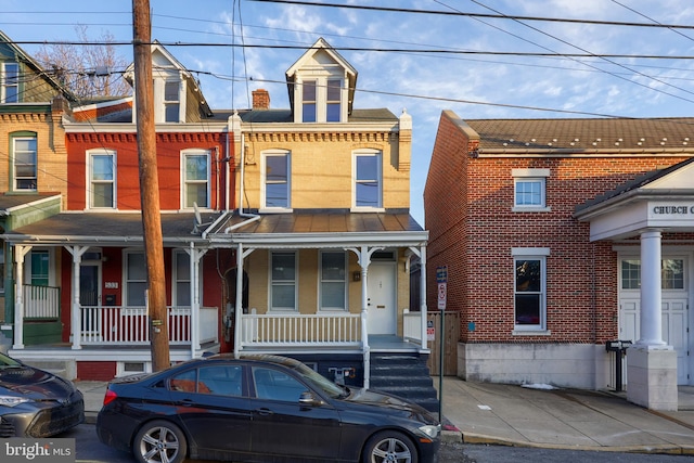 view of property with a porch