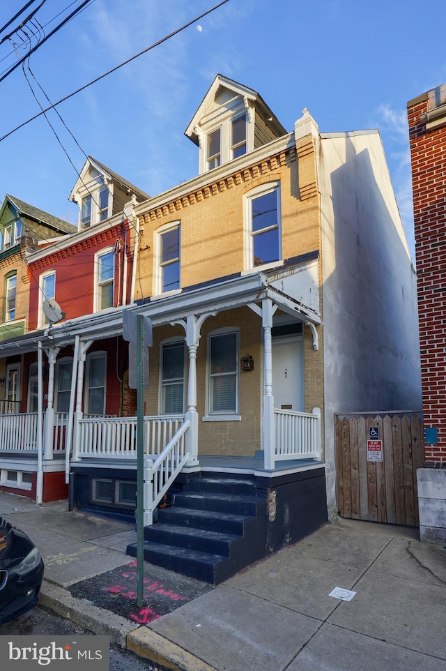 multi unit property featuring covered porch