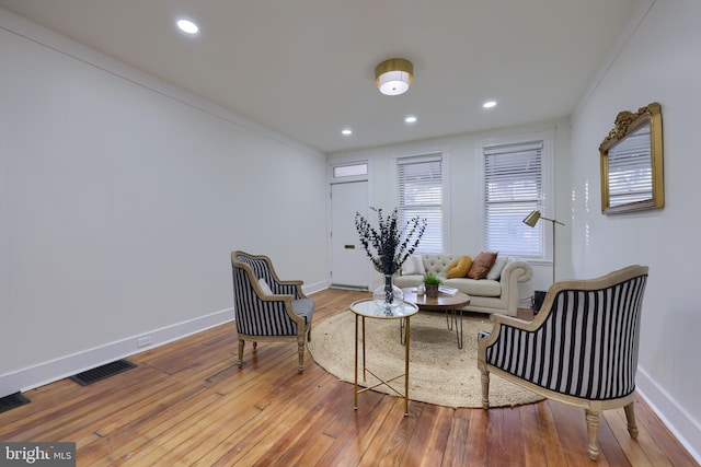 sitting room with light wood-type flooring