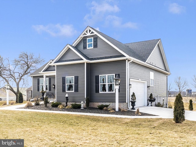 craftsman-style house with a front yard and a garage