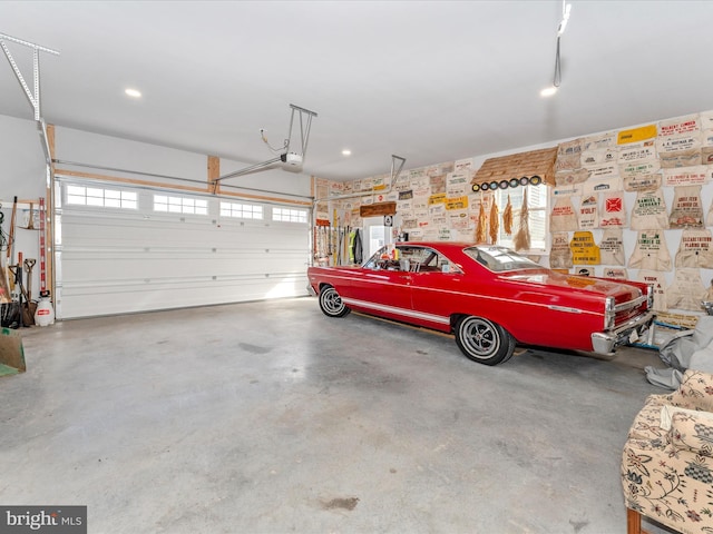 garage featuring a garage door opener