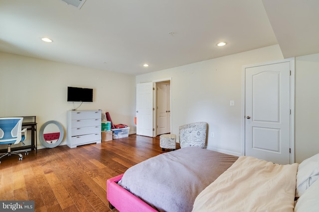 bedroom featuring wood-type flooring