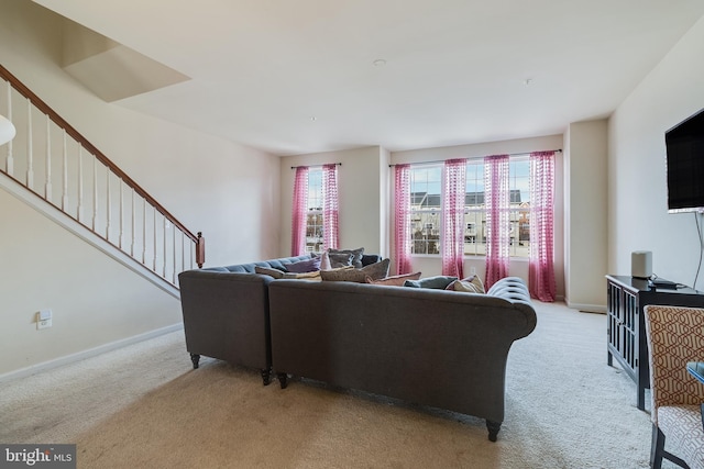 carpeted living room with plenty of natural light