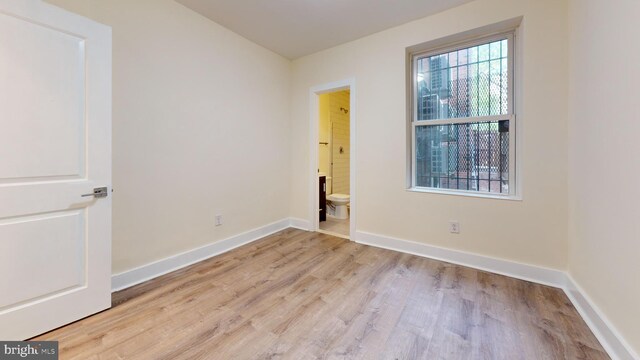 1821 T St NW, Washington, DC 20009 - unfurnished room featuring wood finished floors and baseboards