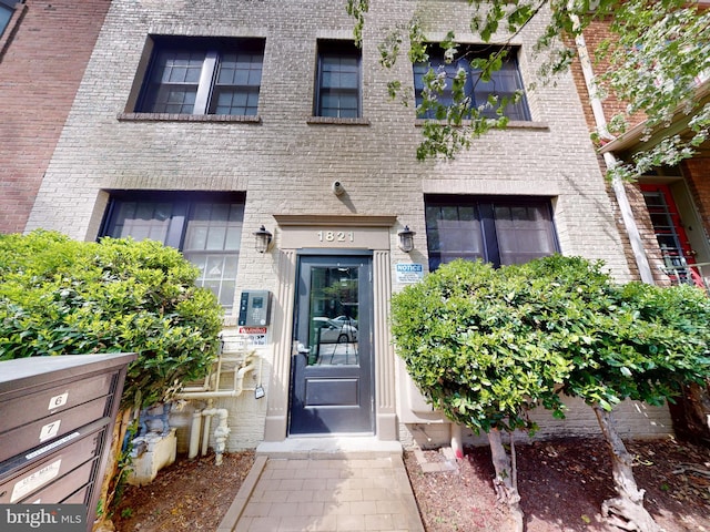 1821 T St NW, Washington, DC 20009 - property entrance with brick siding