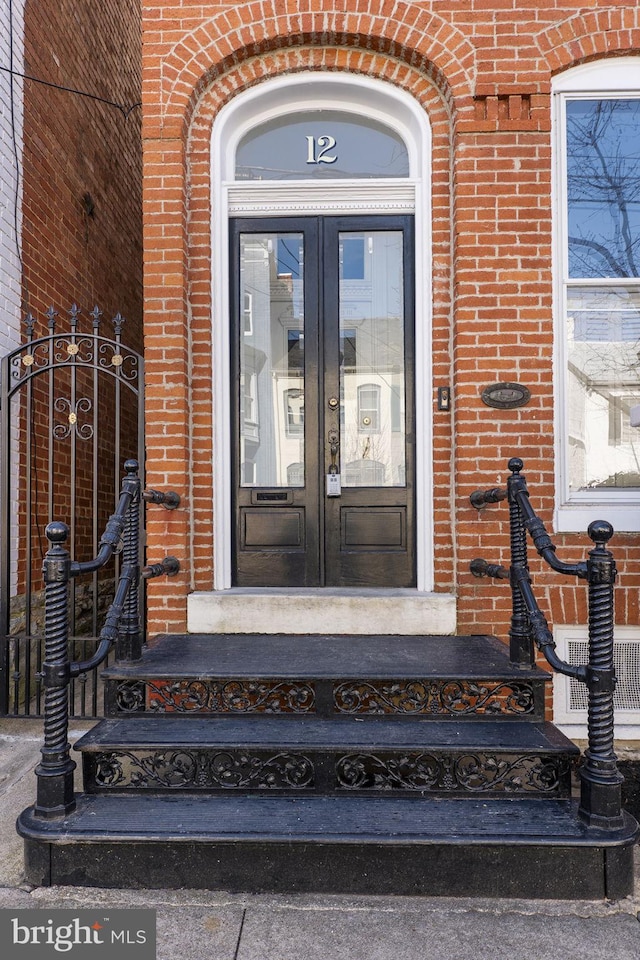 doorway to property featuring french doors