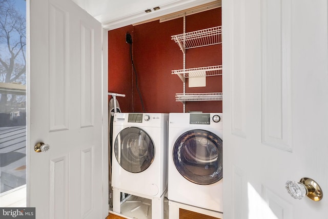 washroom with washer and clothes dryer