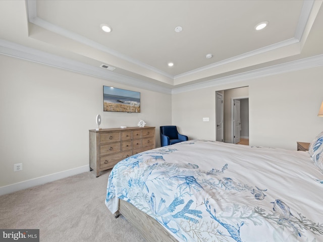 carpeted bedroom with a raised ceiling and crown molding