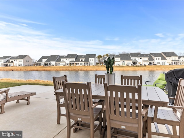 view of patio / terrace with a water view