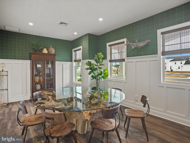 dining space featuring dark hardwood / wood-style flooring