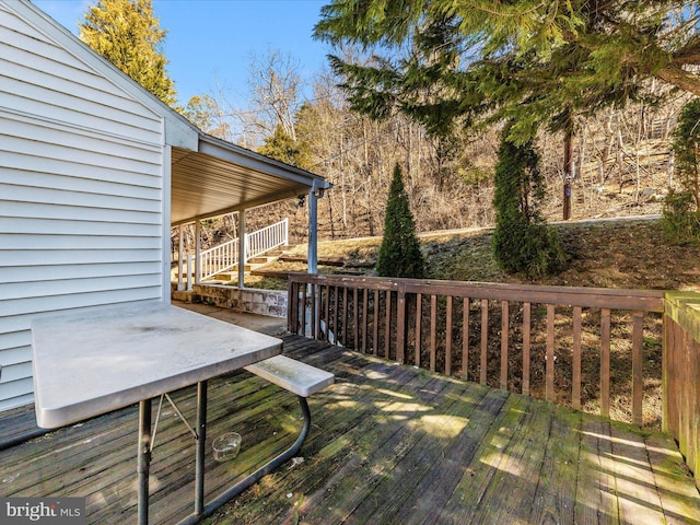 wooden terrace featuring stairway