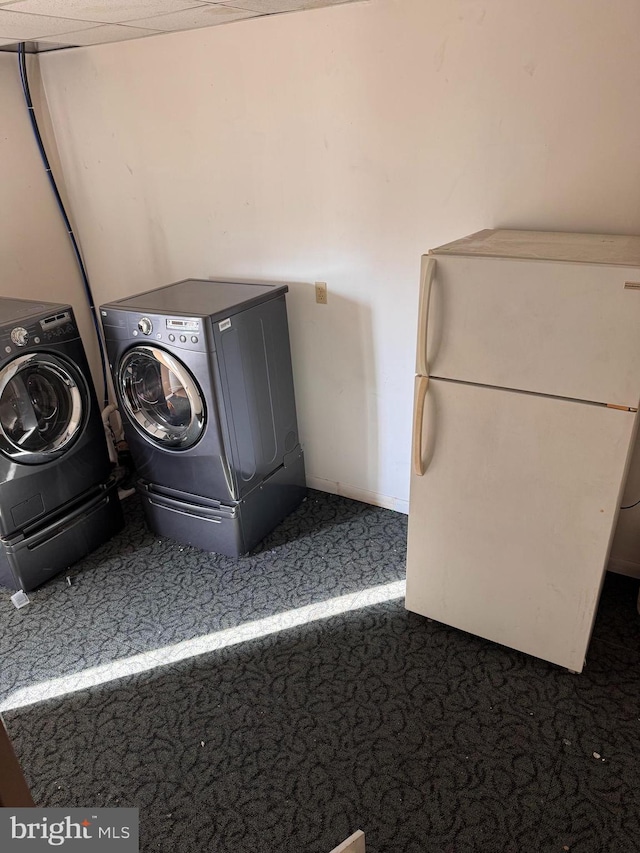 laundry area with laundry area and separate washer and dryer