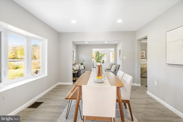 dining room featuring light wood-type flooring