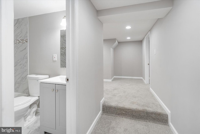 staircase featuring carpet floors