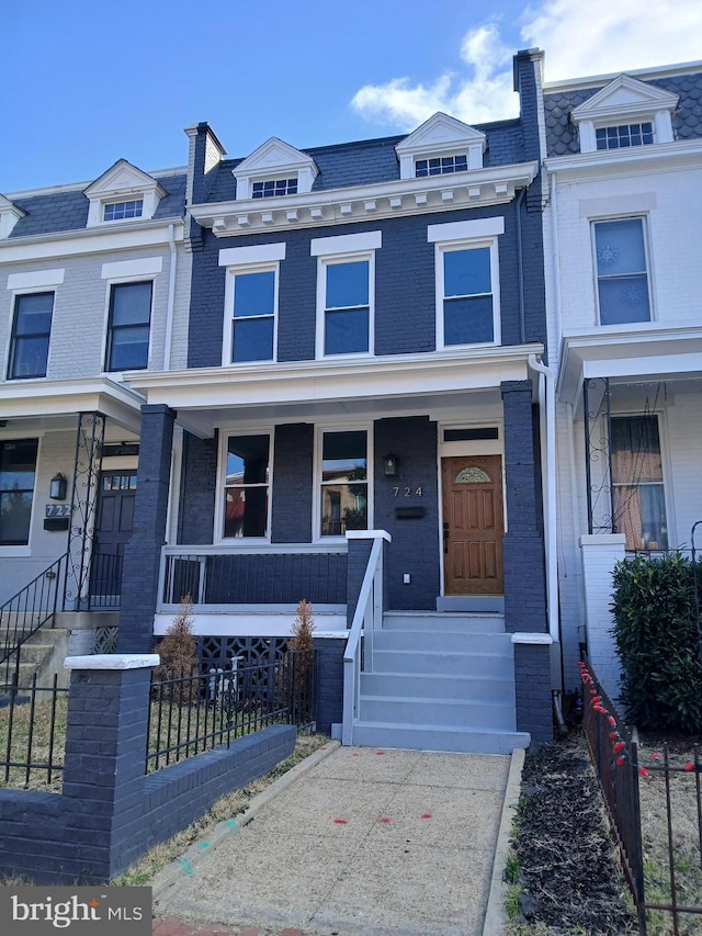 view of property with a porch