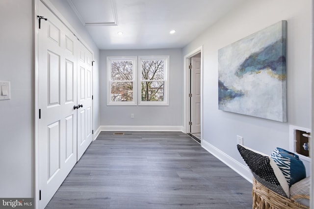 bedroom featuring a closet and dark hardwood / wood-style floors