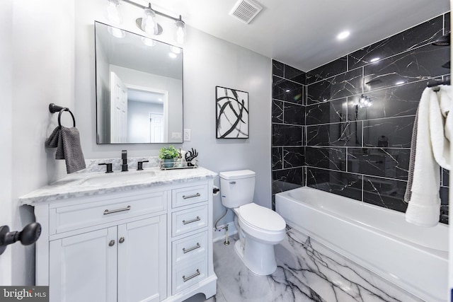 full bathroom with tiled shower / bath combo, vanity, and toilet