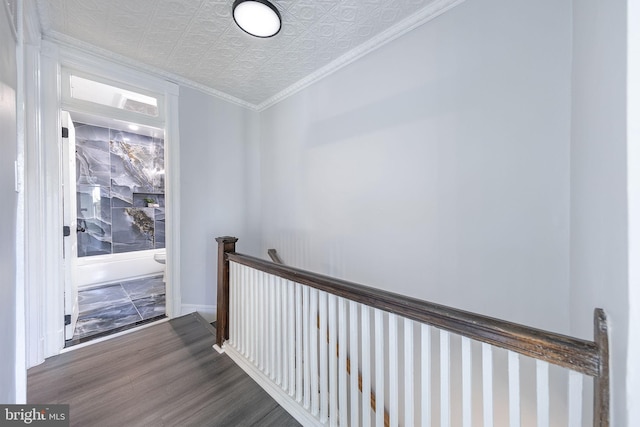 hall featuring crown molding and wood-type flooring