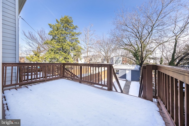 view of snow covered deck