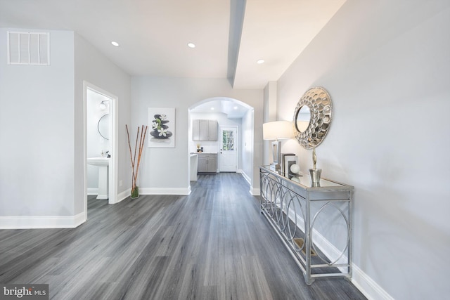 hallway featuring dark hardwood / wood-style floors