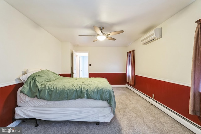 carpeted bedroom featuring a baseboard heating unit, a wall unit AC, and ceiling fan