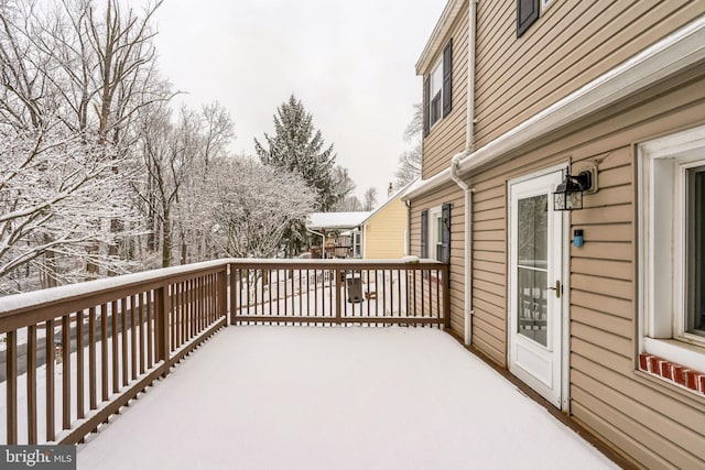 view of snow covered deck