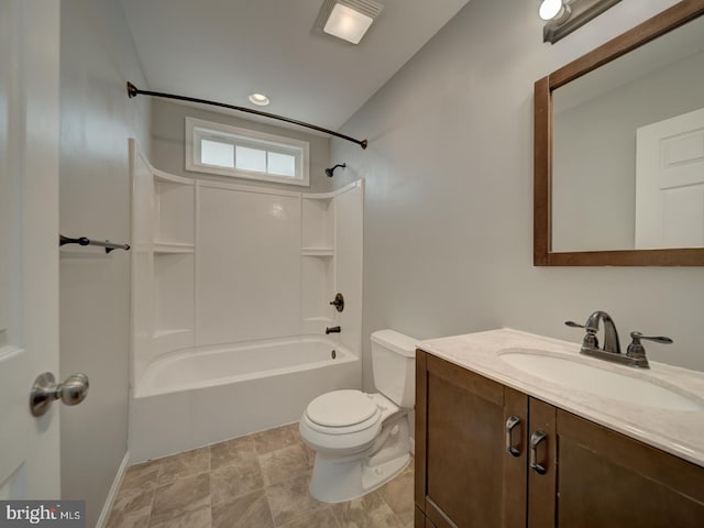 bathroom with shower / washtub combination, vanity, and toilet