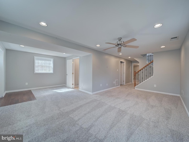 interior space with stairs, baseboards, and recessed lighting