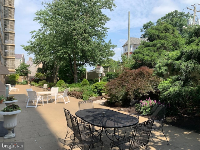 view of patio featuring outdoor dining space