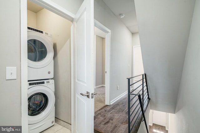 2941 Cecil B Moore Ave, Philadelphia, PA 19121 - laundry room with stacked washer and clothes dryer and wood finished floors
