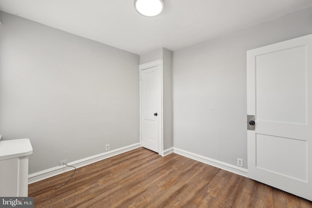 empty room featuring hardwood / wood-style floors