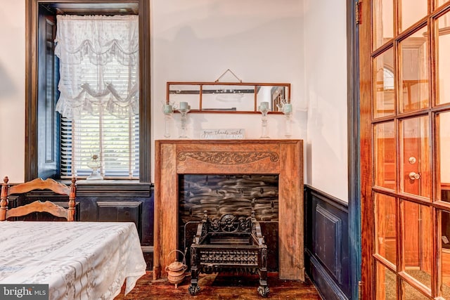 bedroom featuring a fireplace