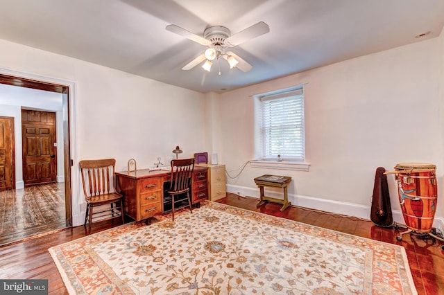 office featuring hardwood / wood-style floors and ceiling fan