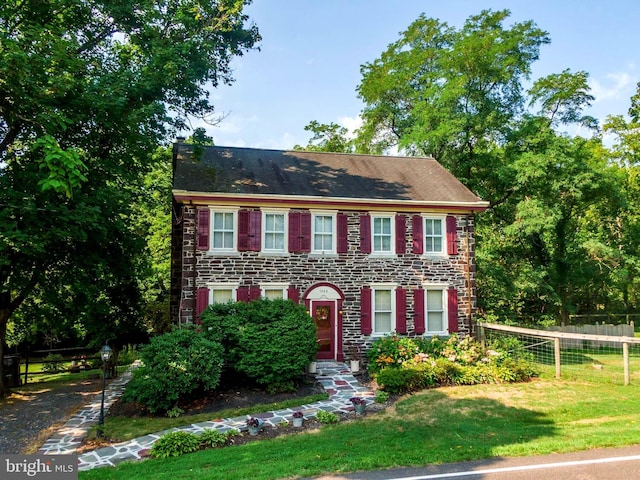 colonial house with a front lawn