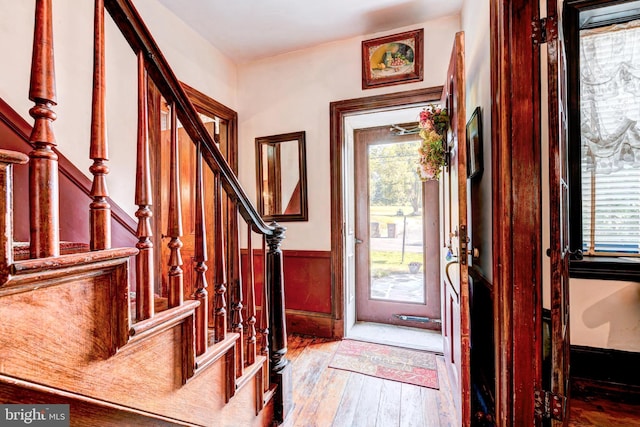 foyer entrance with light hardwood / wood-style flooring