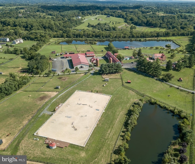 birds eye view of property featuring a rural view and a water view