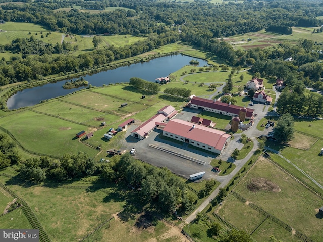 aerial view featuring a rural view and a water view