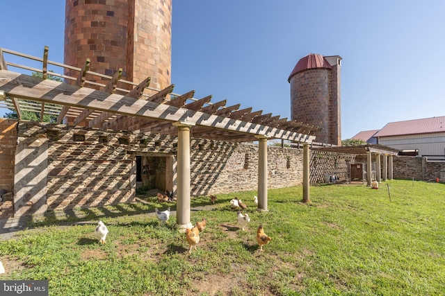 view of yard with a pergola