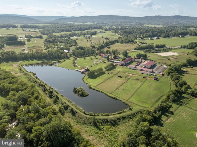 aerial view featuring a rural view and a water and mountain view