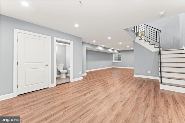 unfurnished living room featuring light wood-type flooring