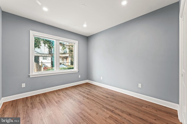 empty room featuring hardwood / wood-style floors