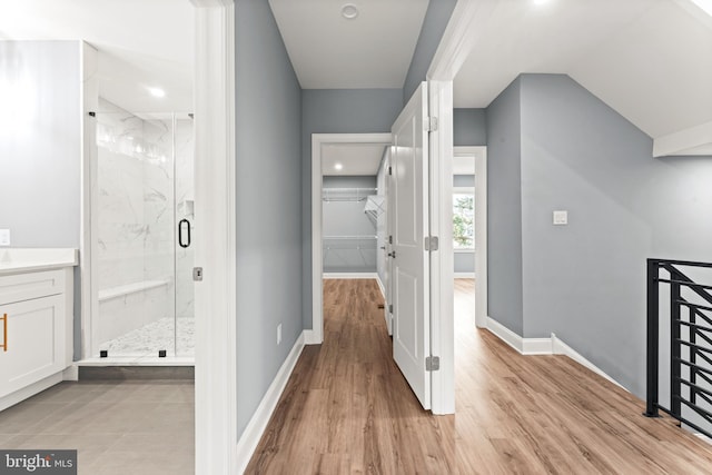 hall featuring light hardwood / wood-style floors