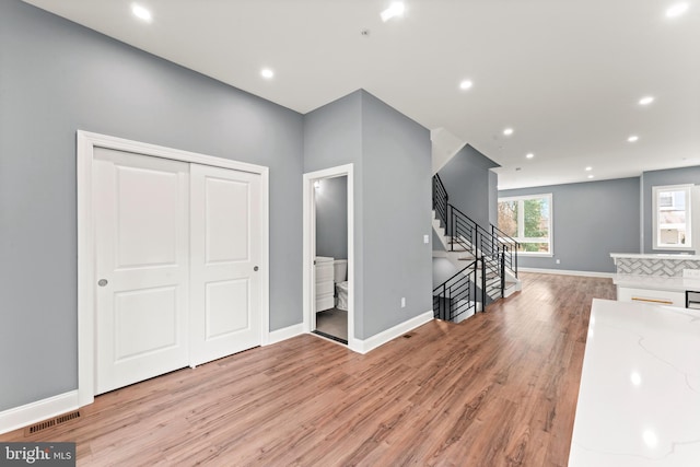 entrance foyer featuring light hardwood / wood-style floors